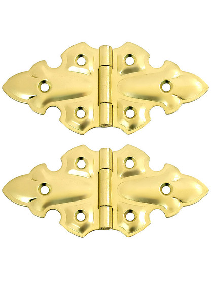 Pair of Gothic Style Surface Cabinet Hinges - 1 3/4 inch H x 3 3/4 inch W In Bright Brass
